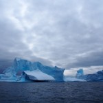 Glowering skies. Blue ice. Happy camera