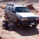 Our intrepid vehicle being indulged in a little roadside maintenance. Comforting